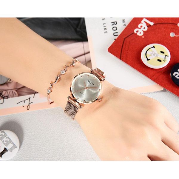

wristwatches hong kong famous watch women's rose gold suction stone steel mesh strap three small pointer women, Slivery;brown