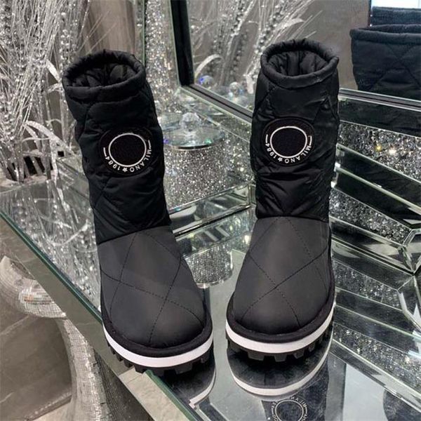 

women designer boots brand booties the comfort boot warm winter comes in water-repellent nylon with down filling and can be worn outdoors, Black
