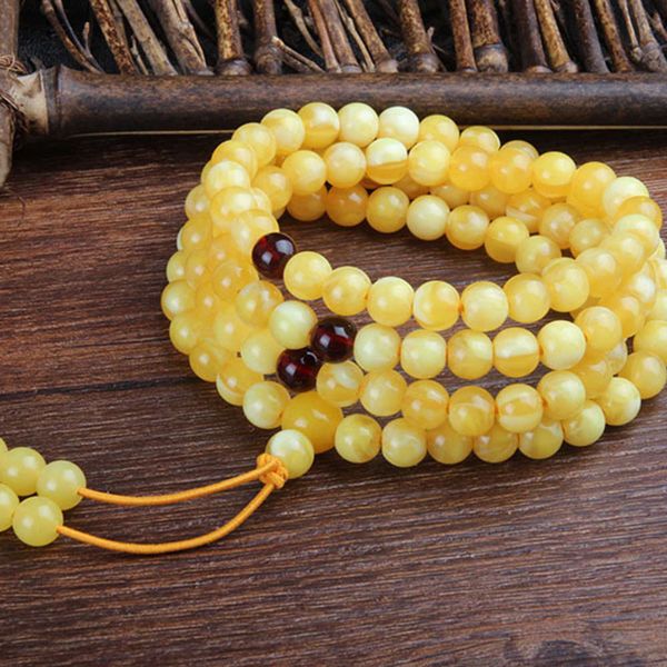 

second generation wax beads white string floating salt water multi circle buddha bracelet, Black