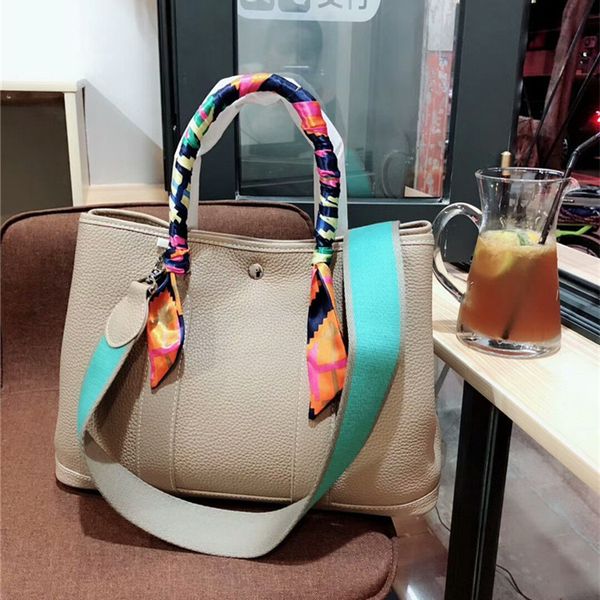

leather women s bag garden bag lychee pattern head leather hand-held single shoulder messenger bag with canvas shoulder strap