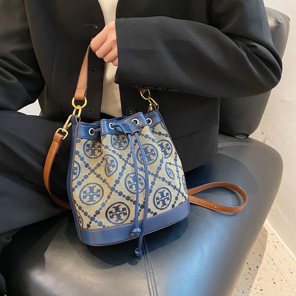 

women's 2021 new fashion printed drawstring portable bucket net red canvas letter messenger bag