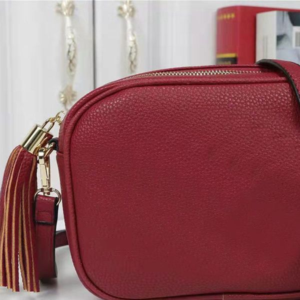 Yüksek Kaliteli Messenger Çanta Kamera Tarzı Omuz Çantaları Hakiki Deri Saçaklı Çanta Düz Zincirler Fermuar Yumuşak Flap Tek Tuval Luxurys Crossbody Satchel MM Boyutu Kırmızı