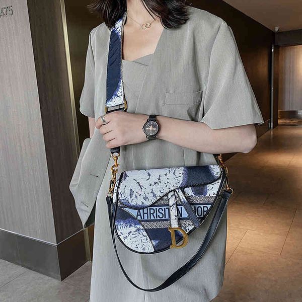 

designer s spring and summer new fashion letter saddle bag messenger hand bill of lading shoulder d- women's armpit bag