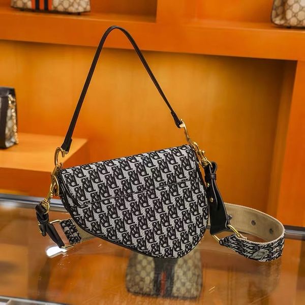 

luxury handbags 2021 new fashion embroidered saddle letter armpit wide shoulder belt messenger women's bag