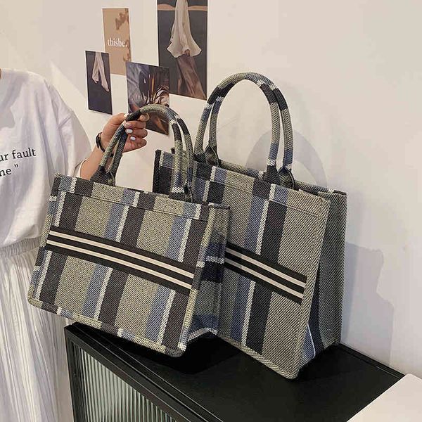 

2022 latest luggage factory wholesale large capacity women's diagonal single shoulder texture portable tote bags