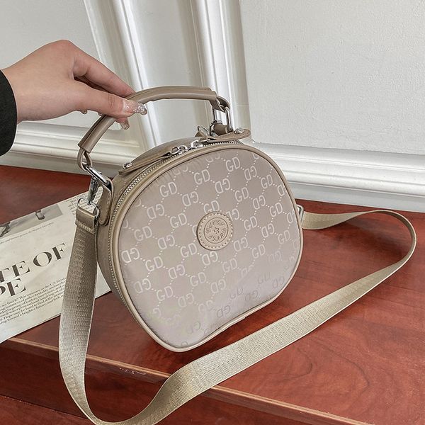 

round bag women's versatile nylon one shoulder cross carrying small round