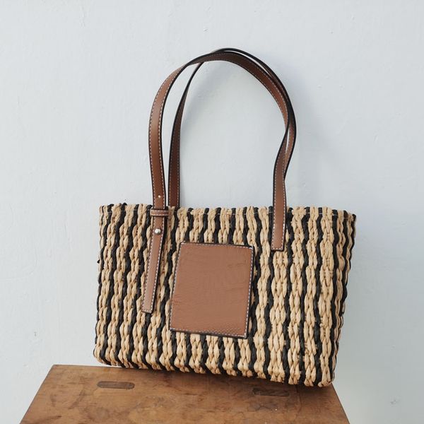 

70% off design hand 2021 new single shoulder hand stripe woven women's versatile straw bag esb6, Red;black