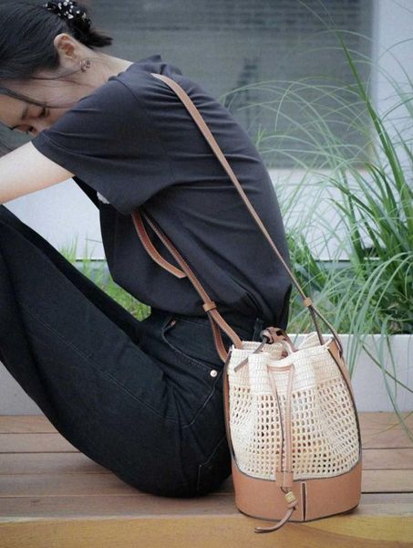 

evening bags 2021 women hollow drawstring woven bucket bag shoulder messenger large capacity color matching