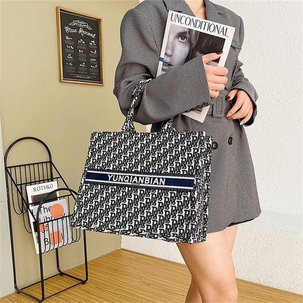 

outlet sale 80% off fashion one shoulder canvas tote bag women's 2022 new fashion ins large capacity versatile portable high sense of f