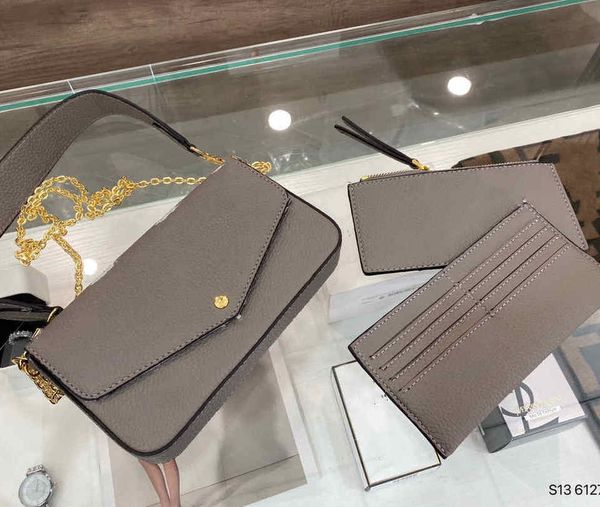 

new luxury bag ms removable metal chain have 3 packets of mobile phone, cards, cash, keys, lipstick and can accommodate other daily affairs,