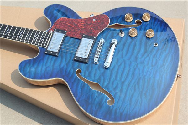 

electric guitar, semi hollow body jazz guitars, metalic blue,davegrohl 335
