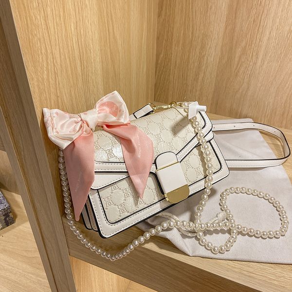 

luxury handbags hong kong women's trend 2021 new hand pearl belt messenger soft leather single shoulder small square bag