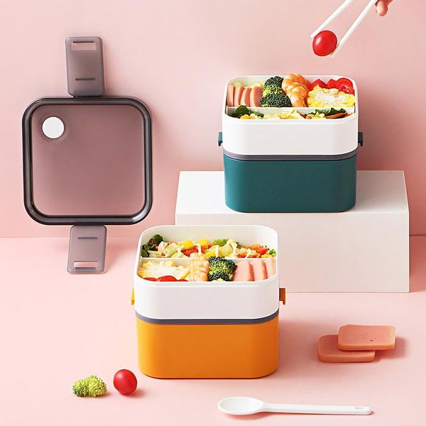 

microwave oven heating lunch box with cutlery set separate dinnerware sets