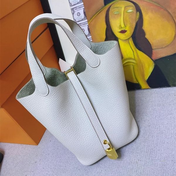 

luxury design handbag 2021 new color matching vegetable basket bucket lychee grain head layer cow leather simple versatile hand bag
