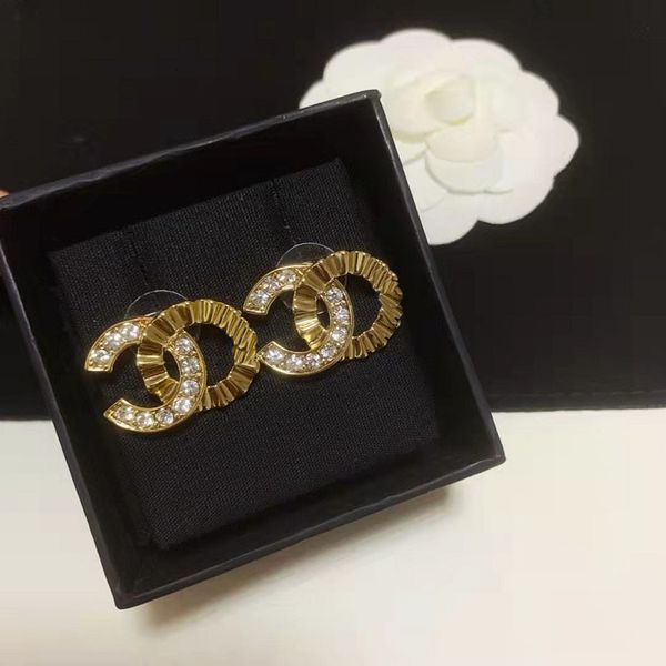 

charms c's golden rhinestone splicing wave earrings, the same material 925 silver needle