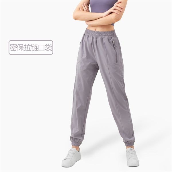 

2021 new fast dry loose breathable sports casual pants zipper pocket three dimensional toe binding slim running yoga pants, Black;white