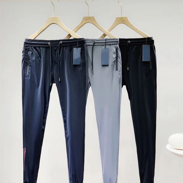 Pantaloni da uomo stile primaverile ed estivo Pantaloni sportivi da piedi sottili Pantaloni da jogging casual traspiranti a sezione sottile di buona qualità 210715