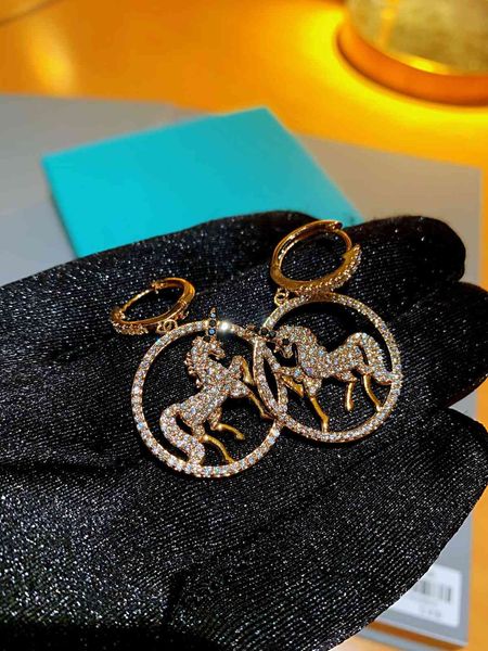 

stud earrings t family japanese caibao unicorn with s925 silver ear nails, Golden;silver
