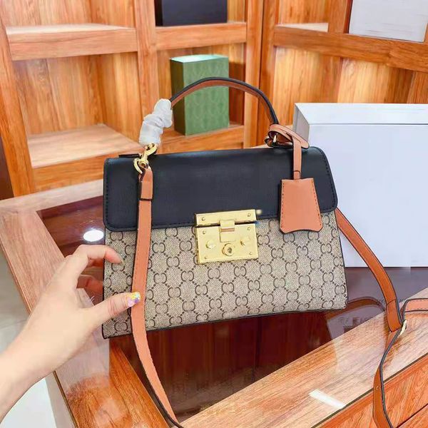 

designer designed shoulder bag. pvc with cowhide. size: 30 * 28cm.