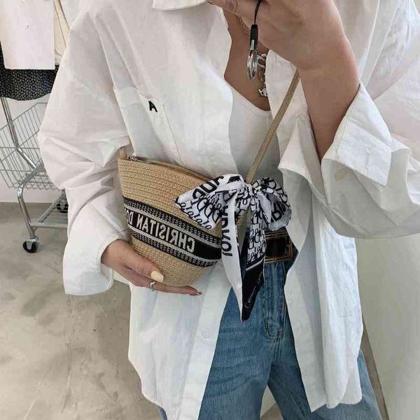 

2022 factory wholesale new silk towel grass woven bucket women's vegetable basket fresh and fashionable single shoulder messenger bag