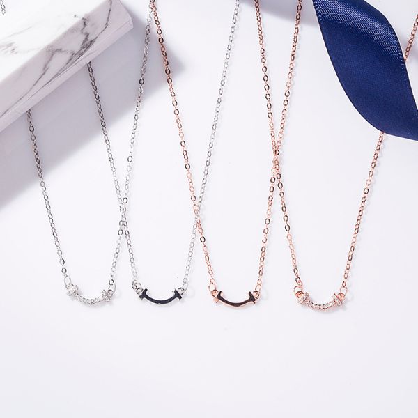 

korean s925 sterling silver mini t family smiling face necklace women's diamond studded, Black