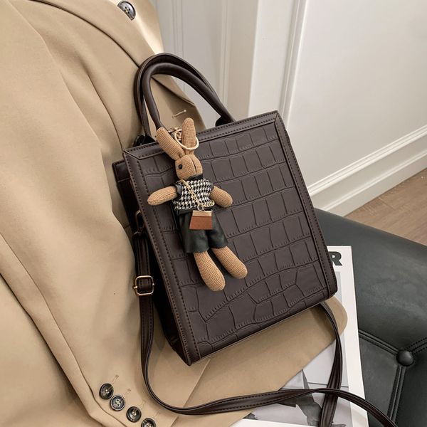 

summer spring and 2010 fashion simple stone grain handbag large capacity one shoulder messenger women's bag