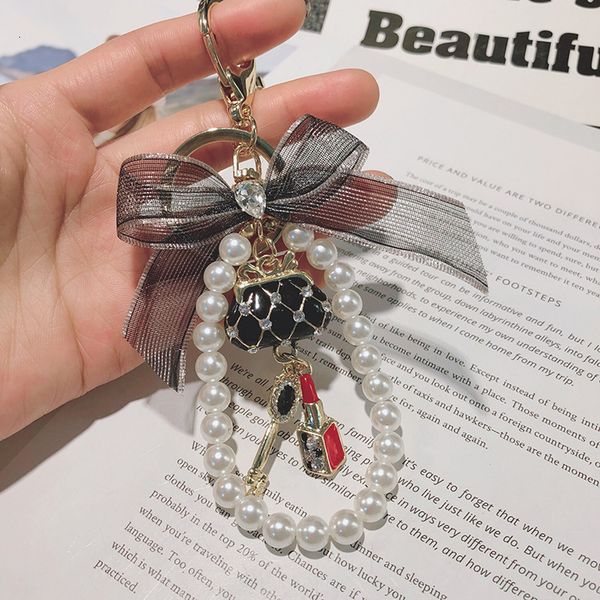 

2021 princess skirt car keychain creative pearl chain lady fashion pendant small fresh, Silver
