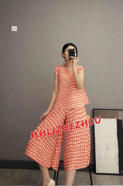 

dresses miyake fold sleeveless round collar t-shirt + wide leg pants lattice suit, White