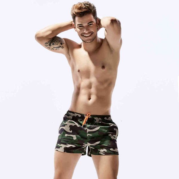 

/ 3 sports shorts 4 men's large fashion trendy camouflage beach pants