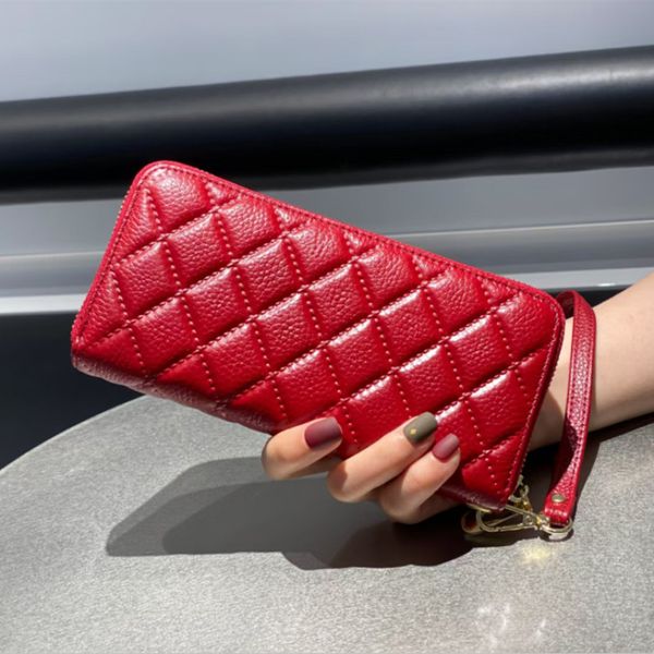 

purse new women's cowhide of leather the layer american foreign trade cross-border clutch bag first and european handbags emboss rgvcp