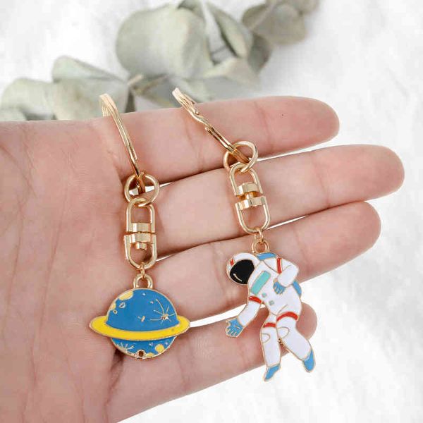 

4 styles escape from the earth ufo space craft astronaut rocket planet spaceman universe star key ring keychain for astrophile, Silver