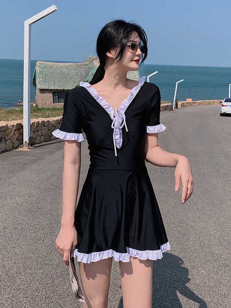 

one women's black conservative large solid color 0368 swimsuit, White;black