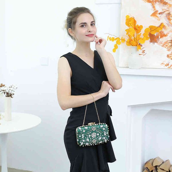 

handmade pearl embroidered dinner bag with diamond and hand
