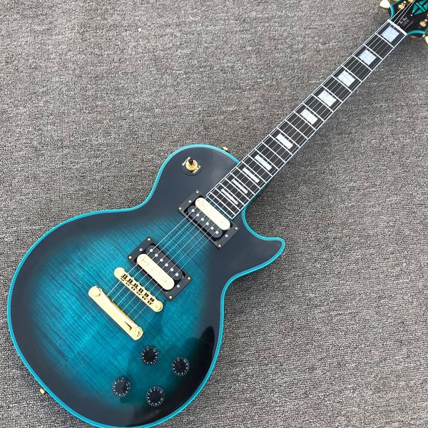 

guitar, blue tiger maple gold hardware, mahogany, custom lp electric guitar