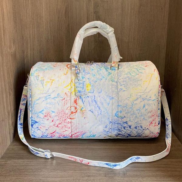 

duffel bag airport designer bags ss21 luggage women men super capacity diagonal across shoulder vacation esigner graffiti travelling luxurys