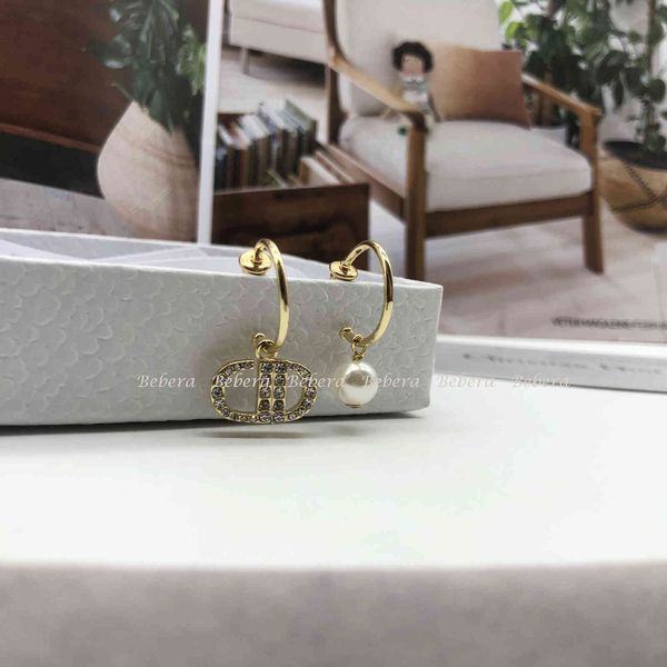 

dd family's 21-year-old asymmetric pearl earrings, Silver