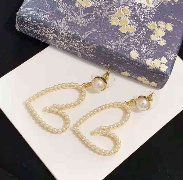 

new quality heart shaped pearl earrings peach earrings red girl, Silver