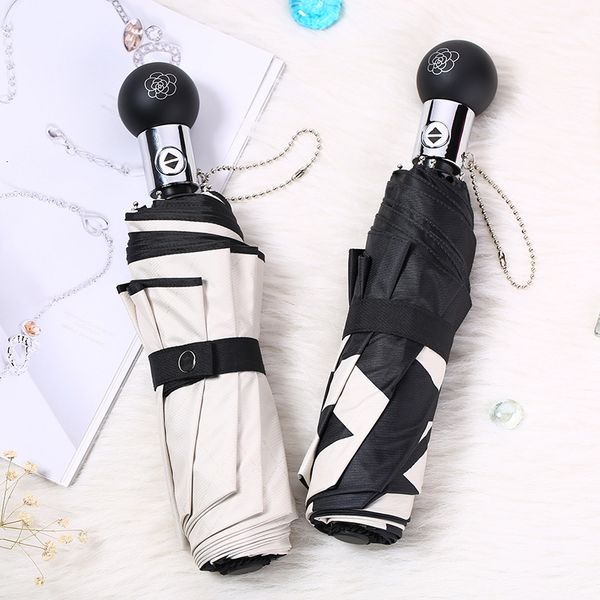 

full three fold black gum sunshade camellia sunscreen anti ultraviolet sun automatic clear umbrella