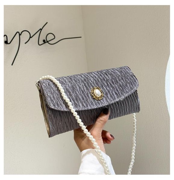 

duffel bags ins net red envelope female 2021 trendy pearl chain fold cloud girl one-shoulder portable armpit