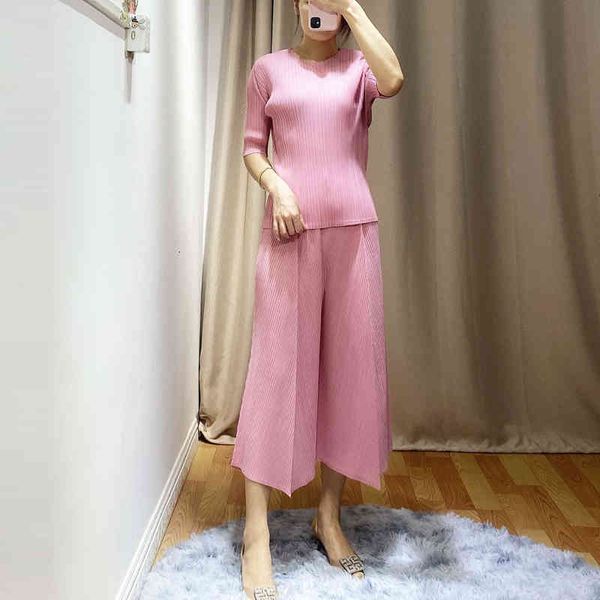 

dresses miyake fold fashion solid suits o-neck half sleeve t-shirt nine points wide-legged pants two-piece suit, White
