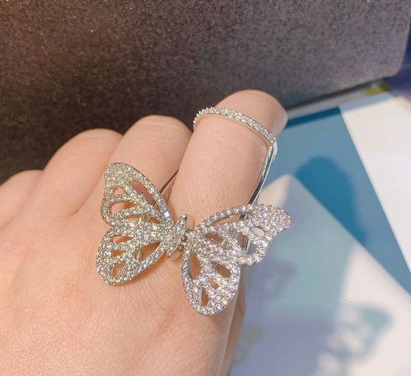 

micro inlaid zircon hollow movable opening butterfly wing ring, Silver