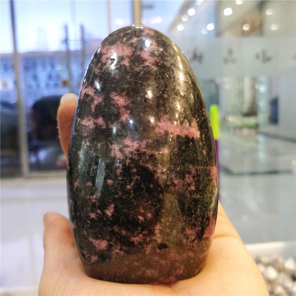 

natural rose quartz folk craft polishing rhodonite crystal cabochons chakras healing stone room design furnish and decorate decorative objec