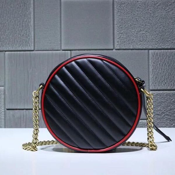

.black retro style small round bag, using playful and lovely round design. bright cherry red rimming to create amazing