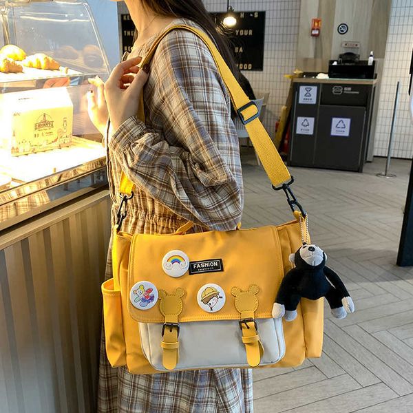 

girl's msenger women's large capacity one shoulder postman student canvas cute handbag