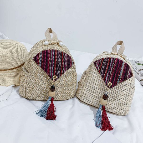 

2021 straw woven bag family style backpack simple tassel backpack