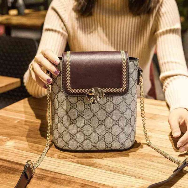 

2022 factory wholesale new model carlo daisy's color contrast printing bucket bag chain single shoulder women's bag messenger bags