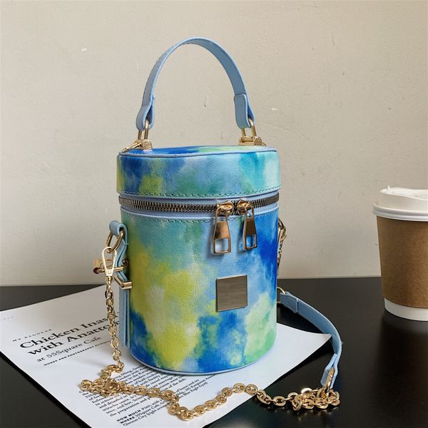 

70% off luxury design handbag bag 2021 new fashion graffiti hand women's color round bucket feeling chain slanting bag x86b