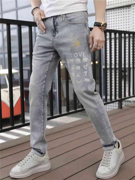 

jean europe's male season small animal alphabet drill impression without wash jeans fashion versatile pants, Blue
