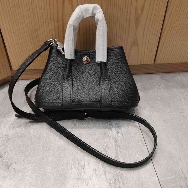 

family's new leather mini garden bag
