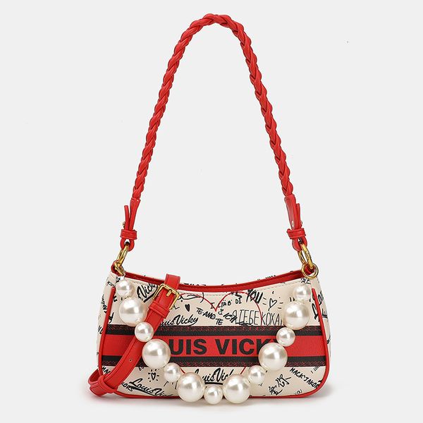 

hong kong niche design high sense printed armpit bag women's 2021 autumn and winter fashion messenger